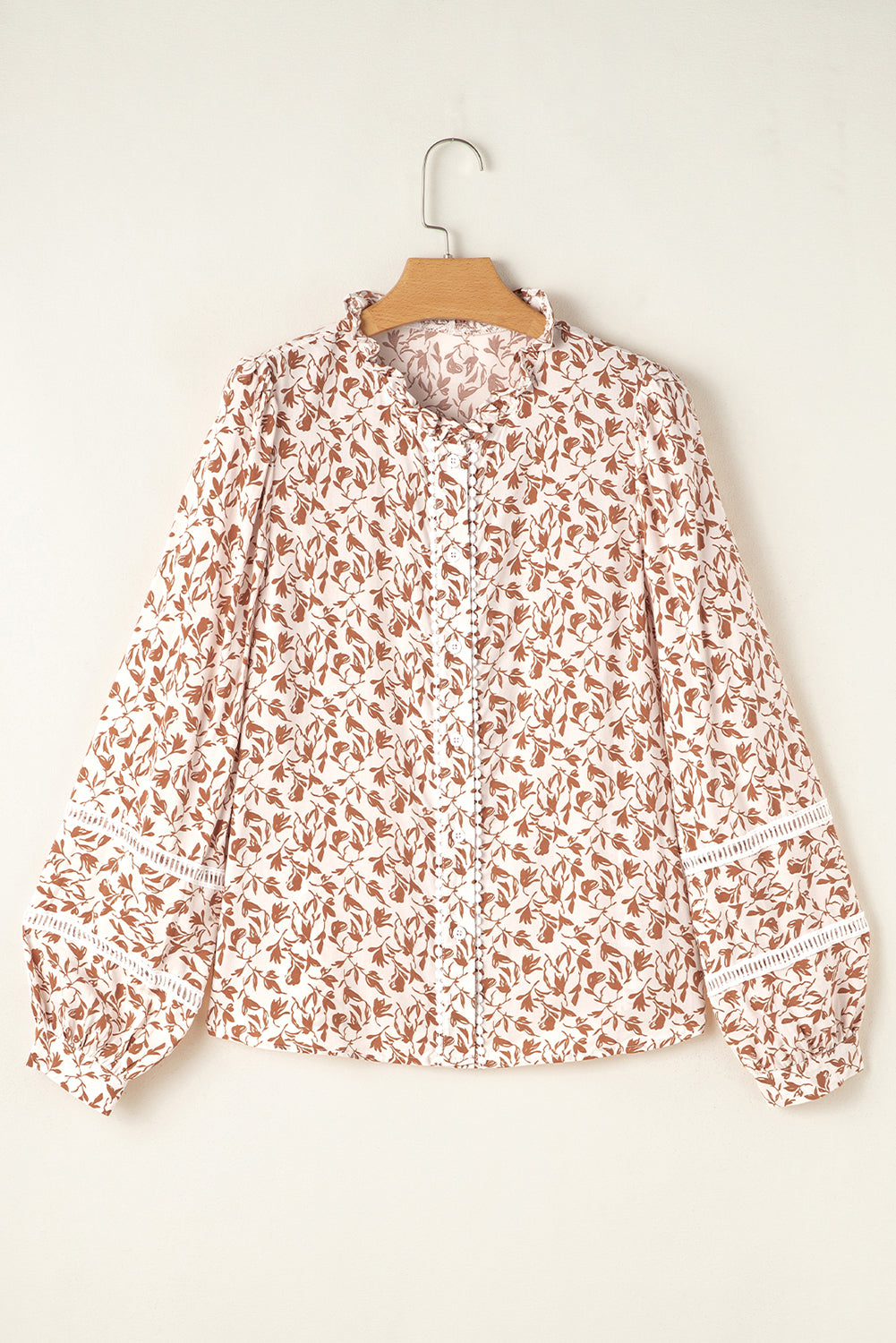 Camisa con mangas abullonadas, detalle de encaje y estampado floral amarillo