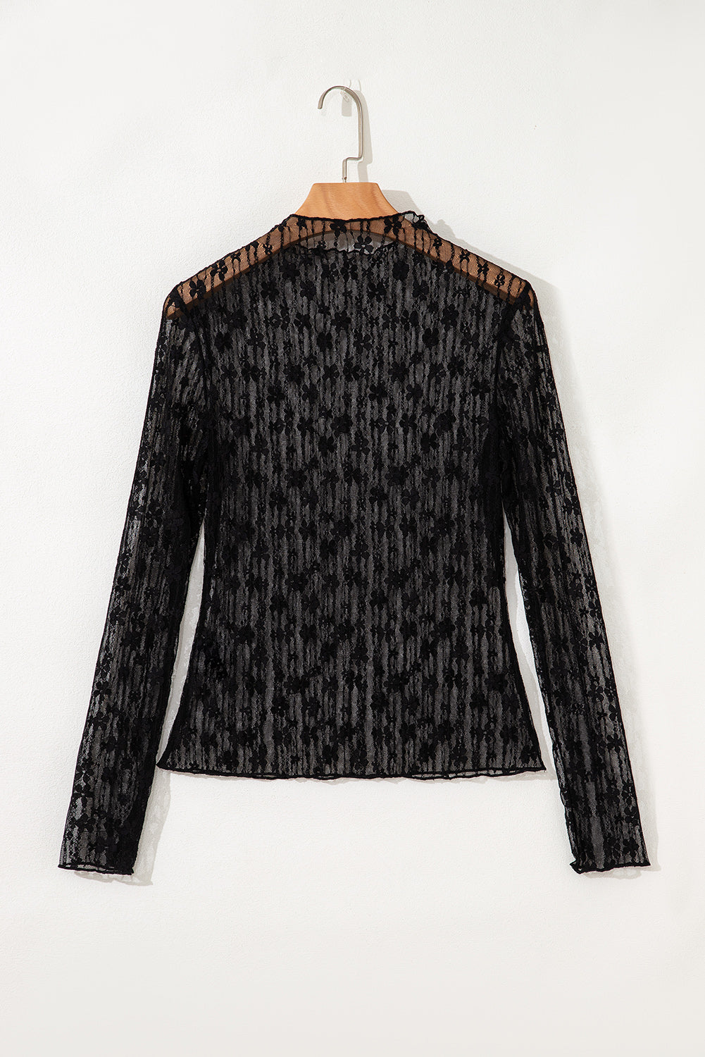 Top ajustado de manga larga con encaje floral transparente negro