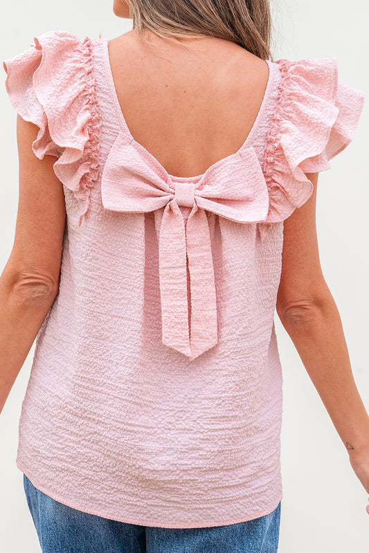 Blusa con mangas de mariposa, volantes y lazo texturizado en color rosa Gossamer