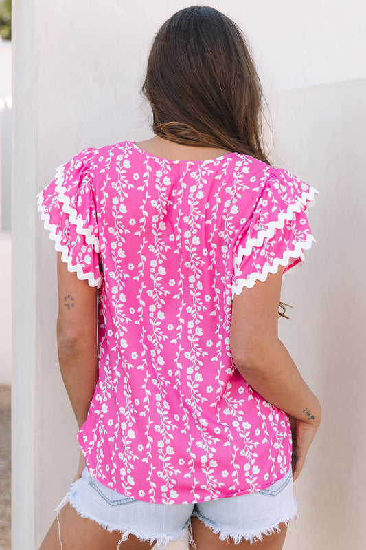 La blusa luce un hermoso estampado floral,rosa
