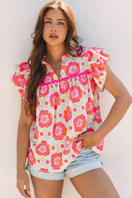 Blusa holgada con cuello dividido, mangas con volantes y ribete de ...