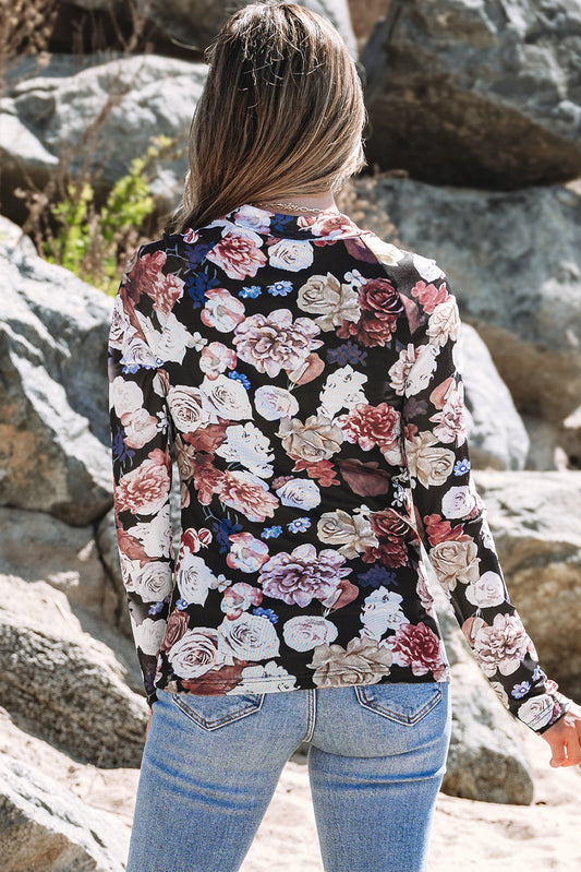 Top ajustado de manga larga con cuello alto y estampado floral de malla rosa