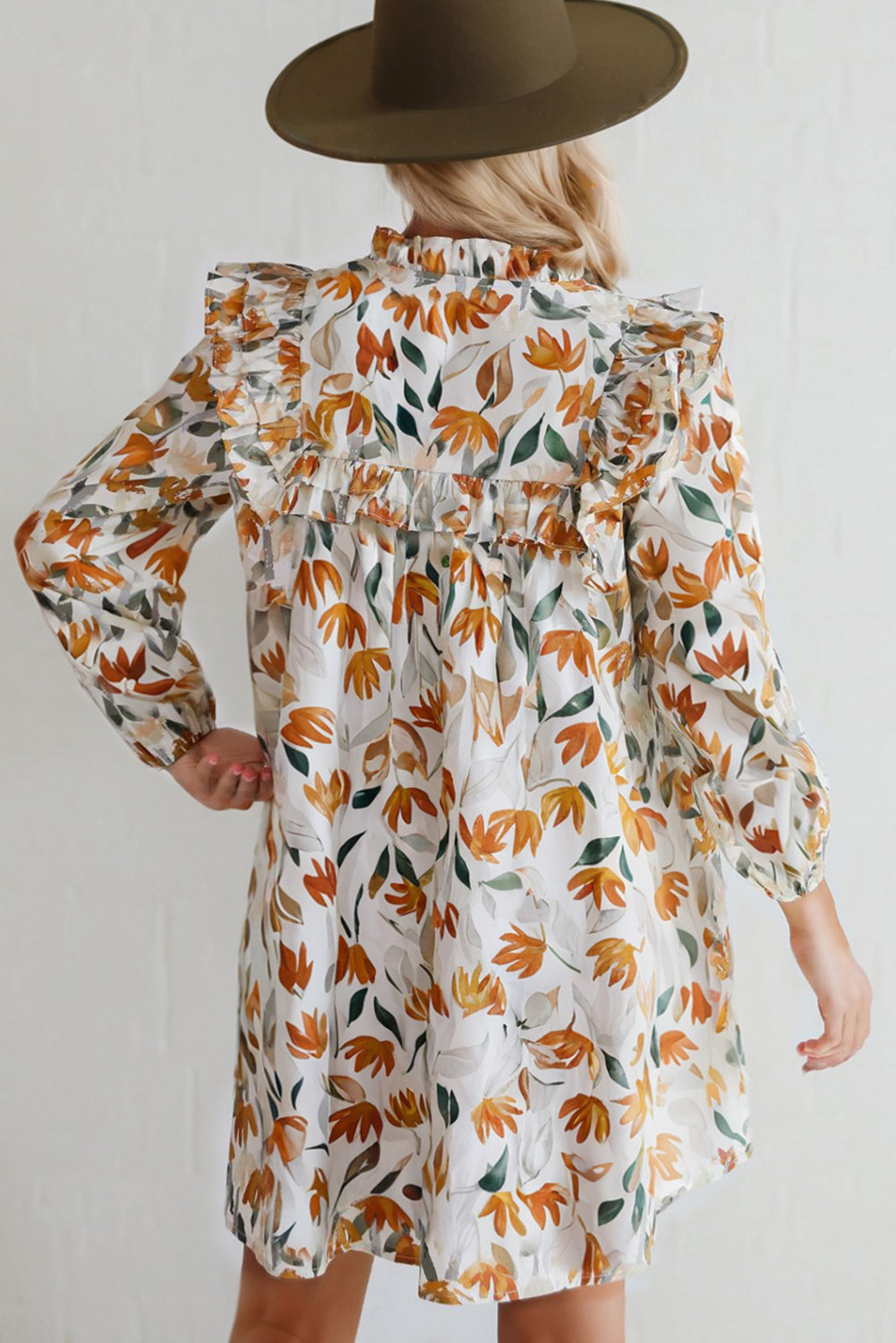 Vestido mini de manga larga con volantes, cuello anudado y estampado floral amarillo