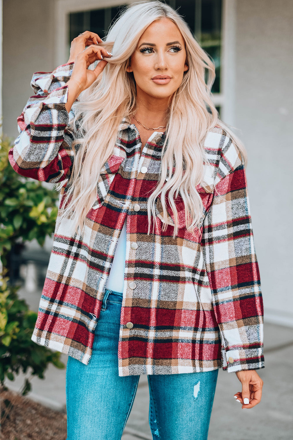 Chaqueta con bolsillos y estampado de cuadros geométricos
